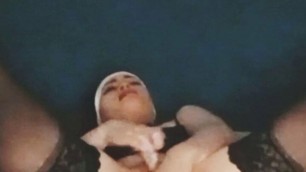 Nun fucking herself in pussy and ass