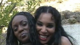 Two ebony honeys share one hard cock